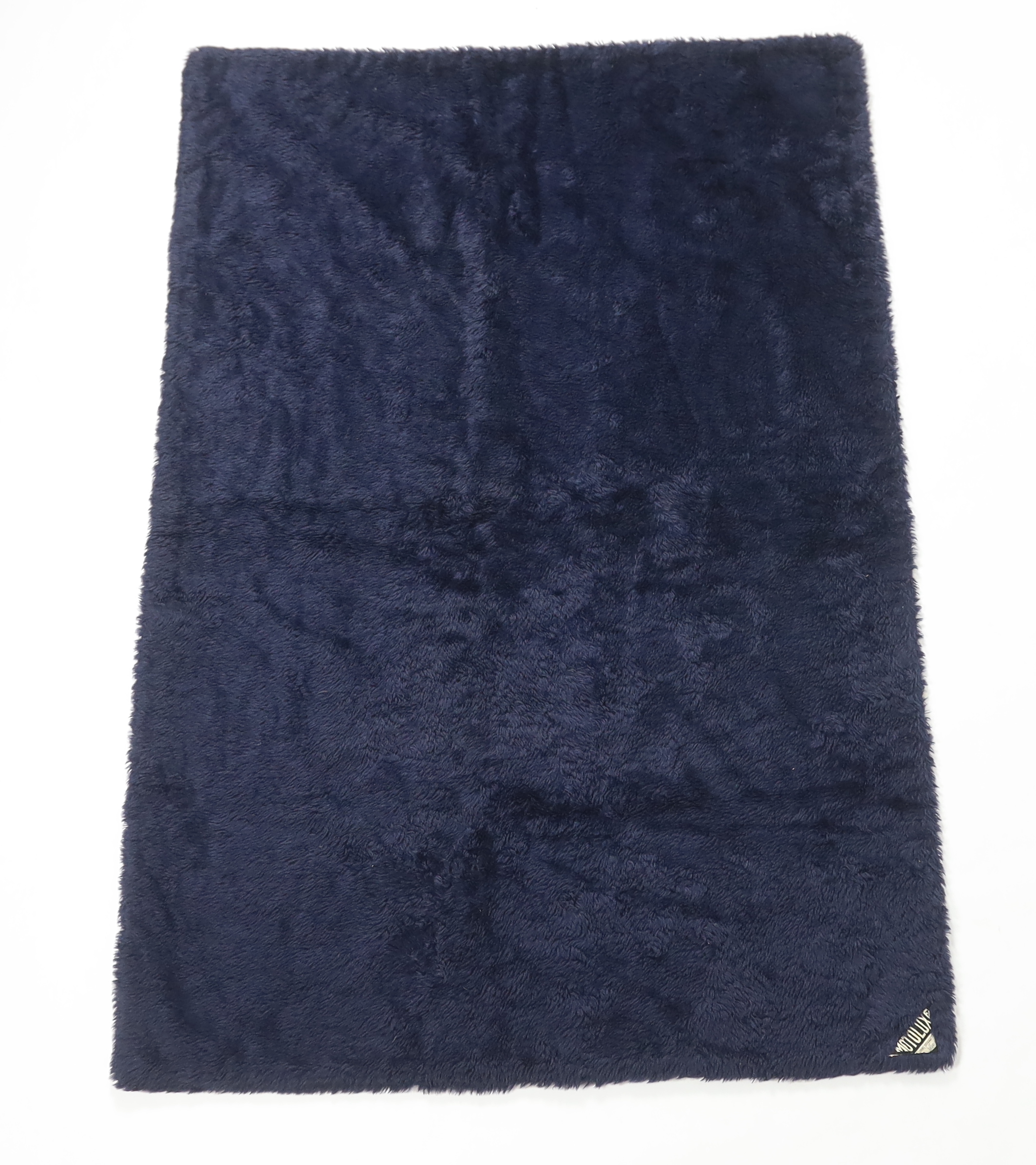 An unusual Motolux vintage car motoring rug, originally made in the 1930’s-40’s from Alpaca wool, reversible, one side navy and the other graduated grey, (the vendor remembers it keeping her warm in a Dicky seat as a chi